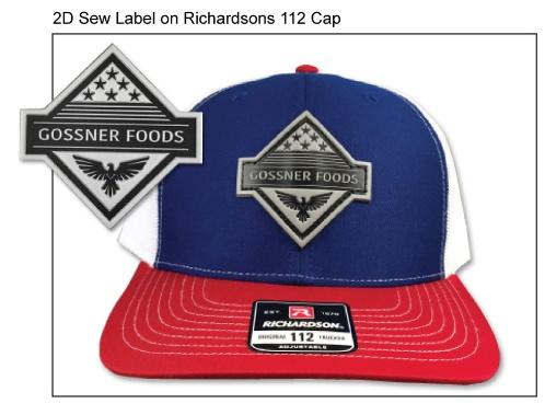 Sewn pvc cap patch.- 2D label sewn on cap.- 2d labels sewn onto caps.