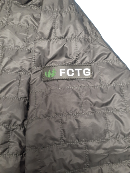 Sew on pvc label on Patagonia puffer vest